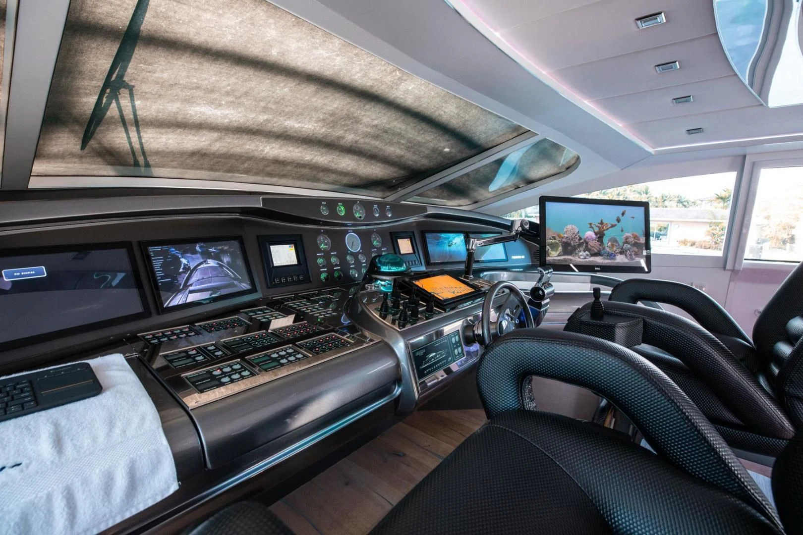 inside of a plane aboard AMORA Yacht for Sale