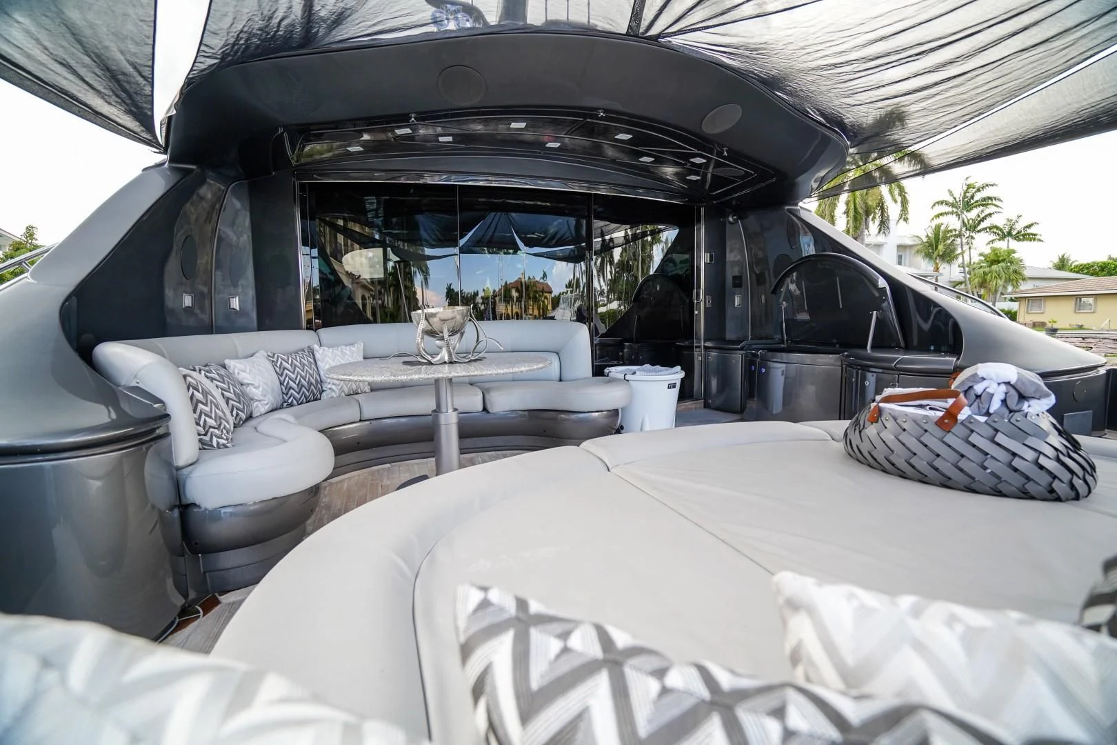 a car with a white sheet and a white bed and a white sheet aboard AMORA Yacht for Sale