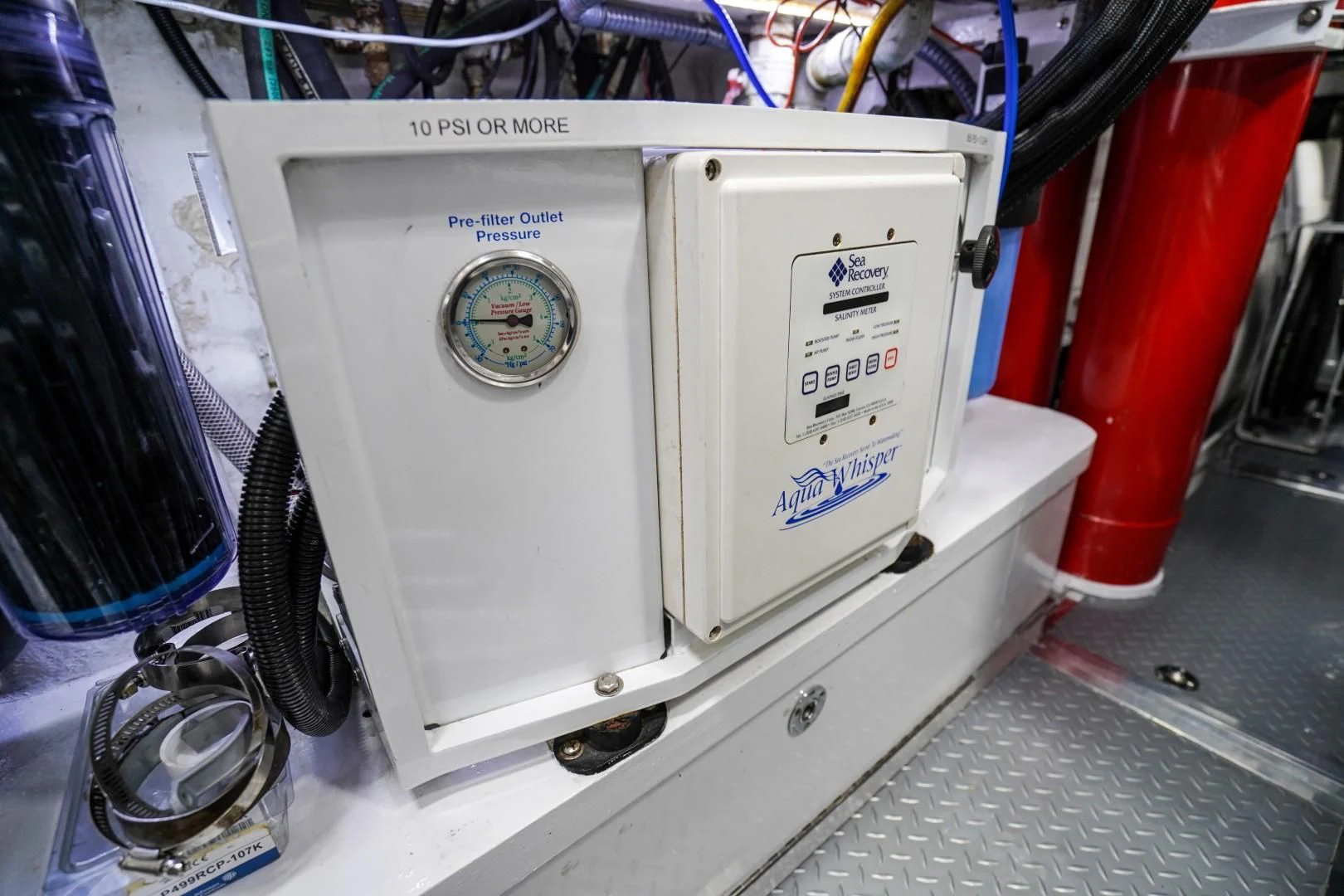 a white machine with a label aboard AMORA Yacht for Sale