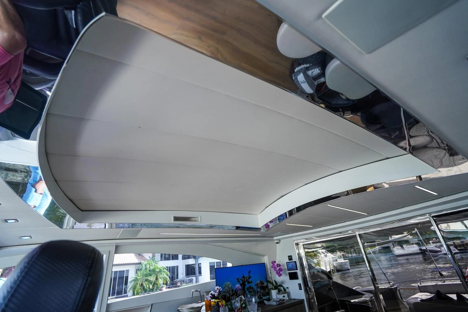 a car with a large spoiler aboard AMORA Yacht for Sale