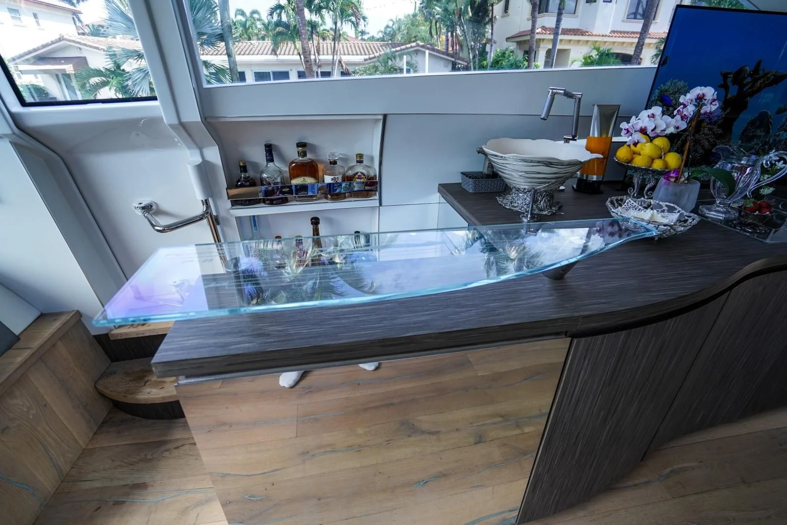 a kitchen with a large island aboard AMORA Yacht for Sale