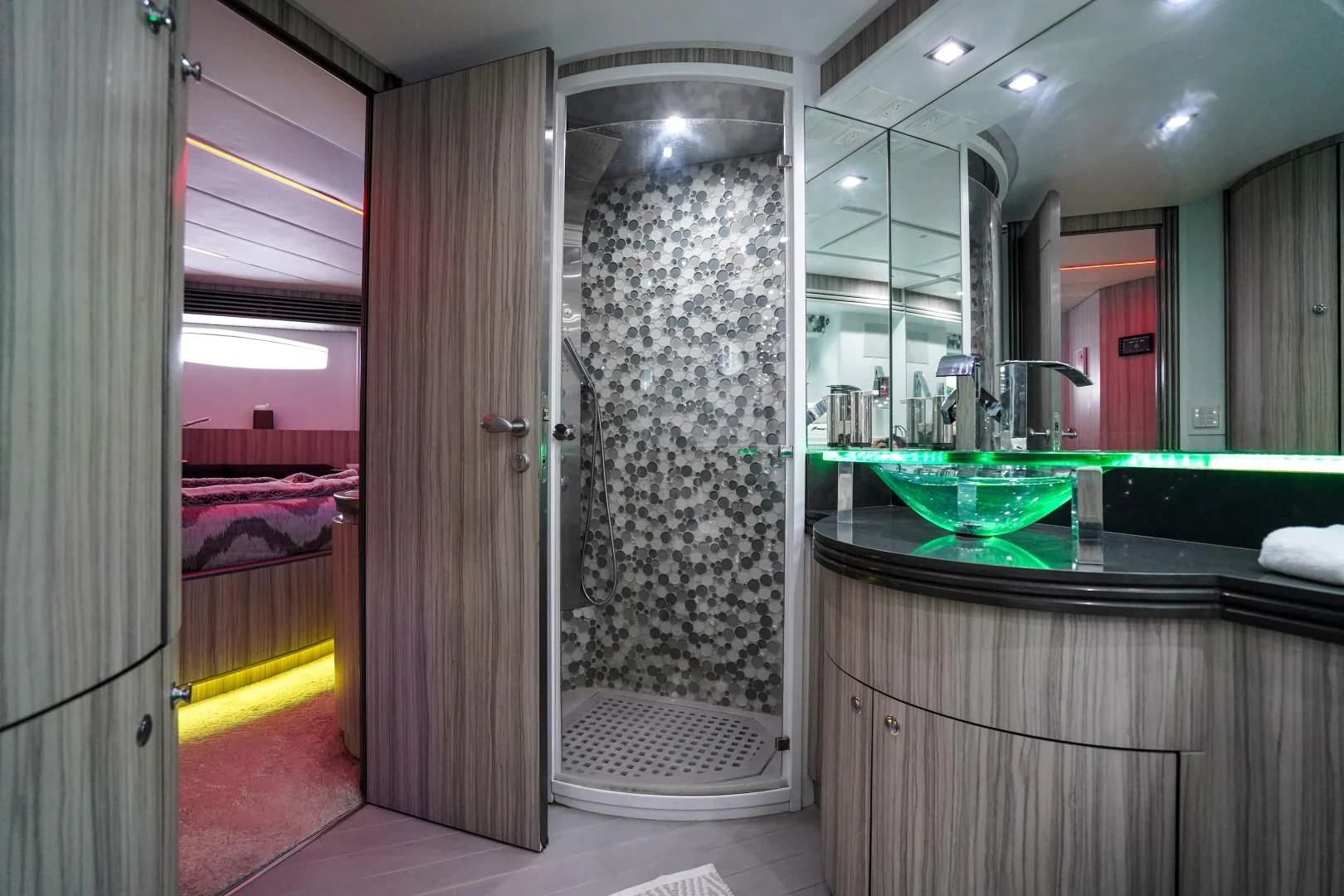 a bathroom with a glass shower aboard AMORA Yacht for Sale