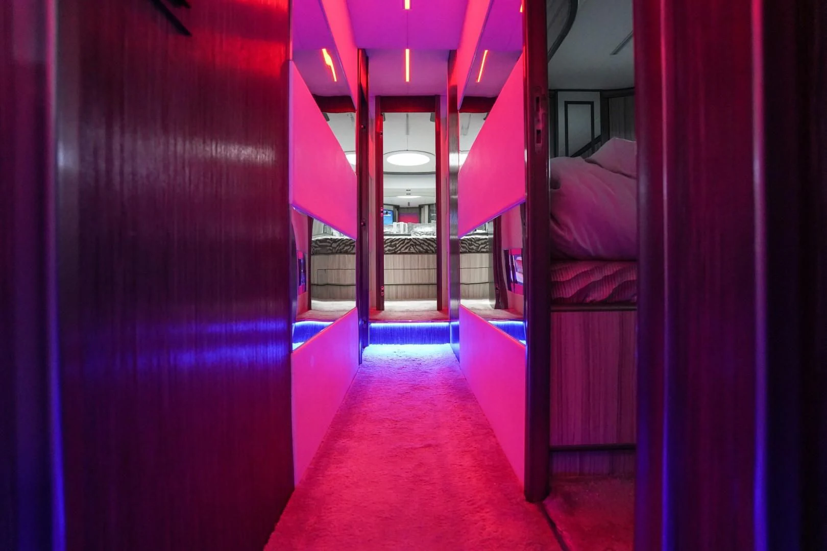 a room with red pillars aboard AMORA Yacht for Sale