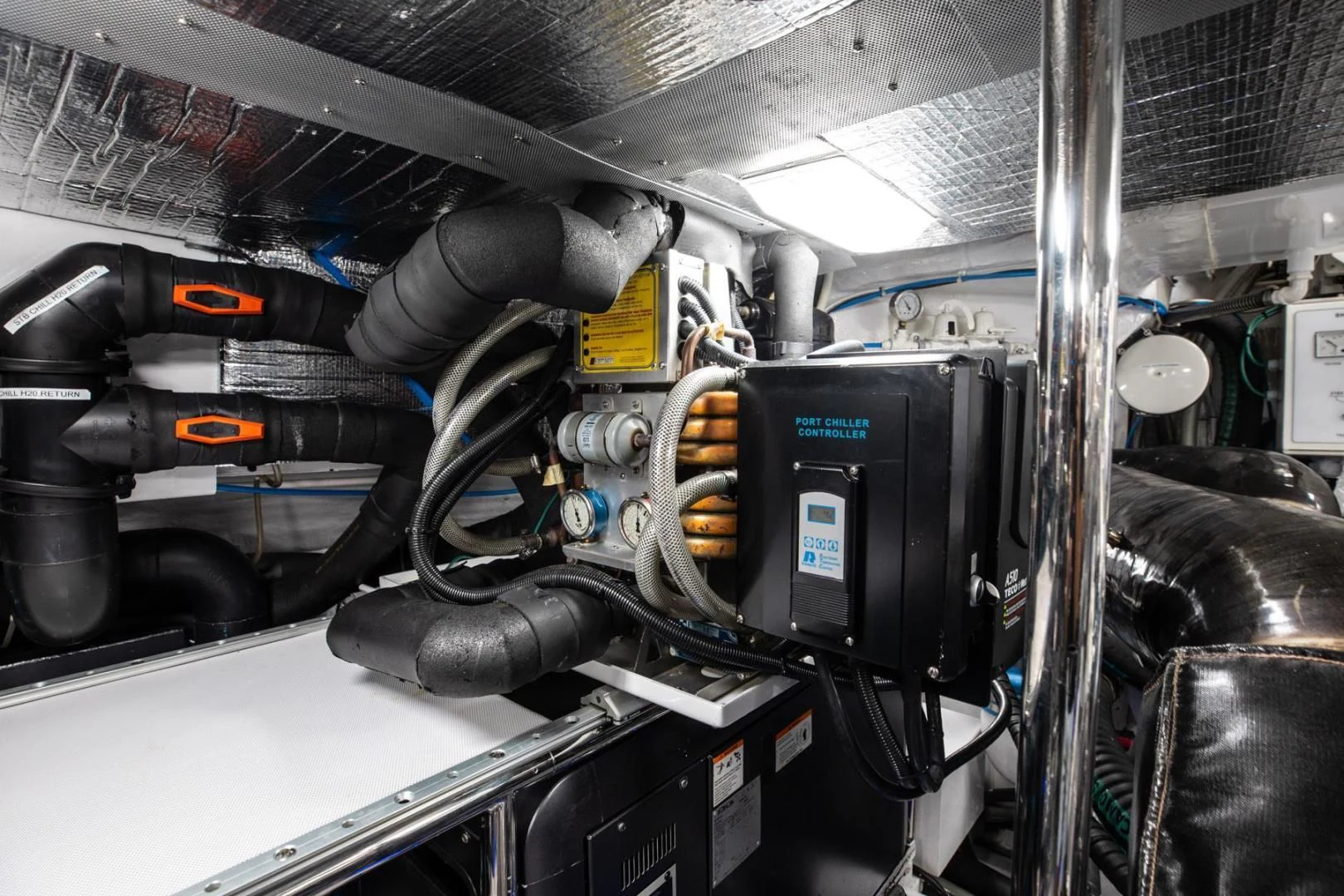 a machine with a large metal pipe aboard AMORA Yacht for Sale