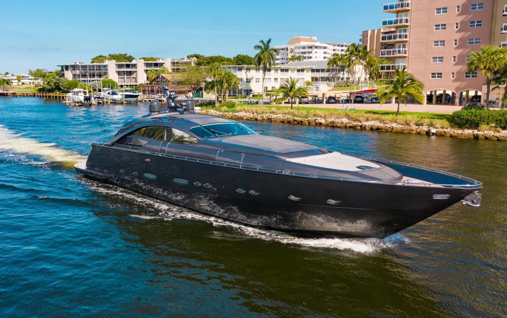 a black boat on water aboard AMORA Yacht for Sale