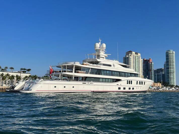 a large white boat in the water aboard SIXTH SENSE Yacht for Sale