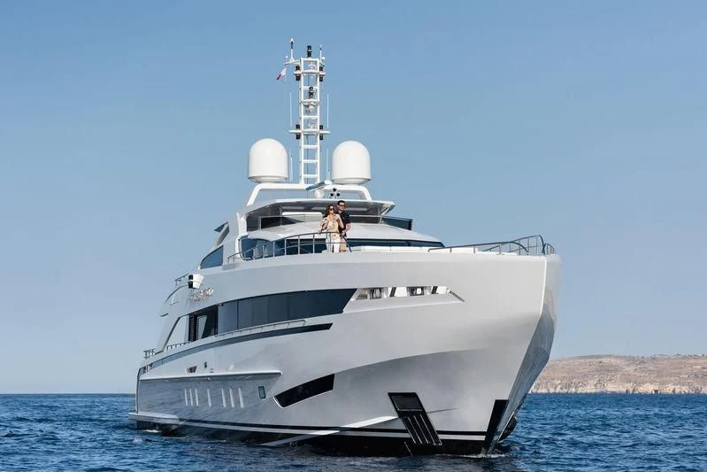 a white boat in the water aboard AMORE MIO Yacht for Sale