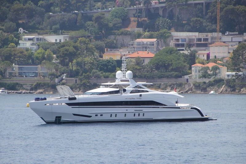 a white yacht on the water aboard AMORE MIO Yacht for Sale