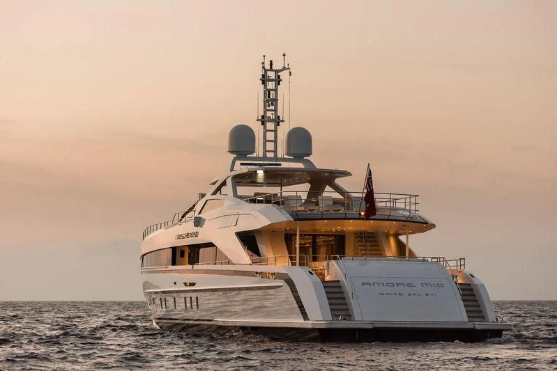 a large ship in the water aboard AMORE MIO Yacht for Sale