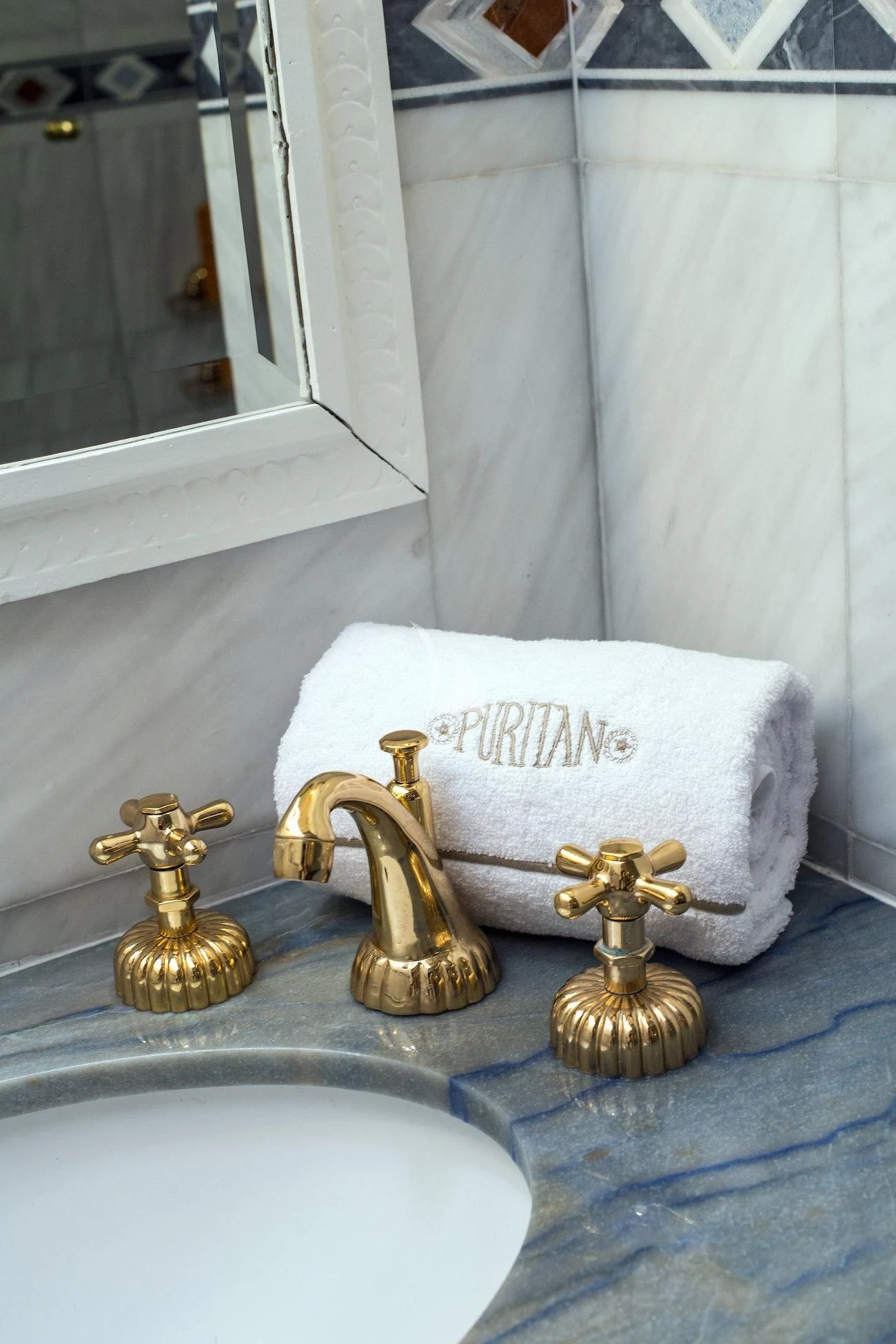 a sink with a towel on it aboard PURITAN Yacht for Sale