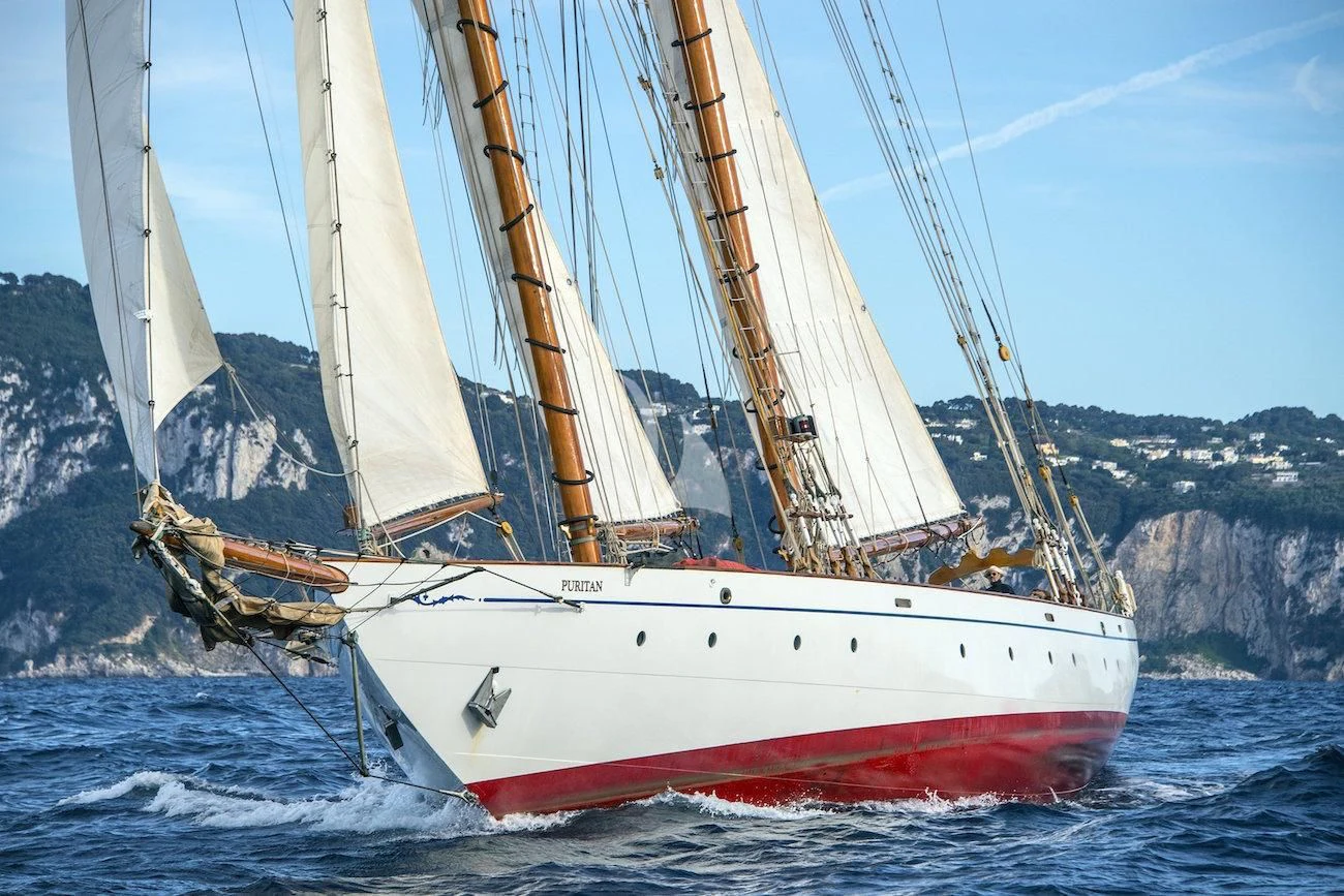 a sailboat on the water aboard PURITAN Yacht for Sale