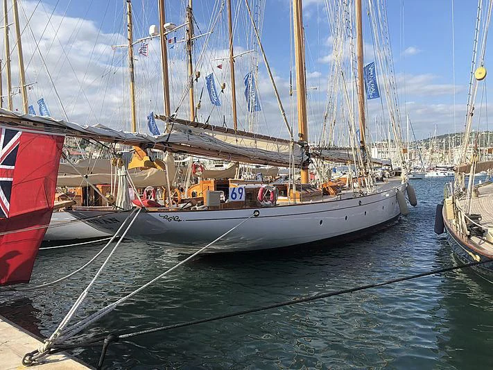 a group of boats are parked in a harbor aboard PURITAN Yacht for Sale