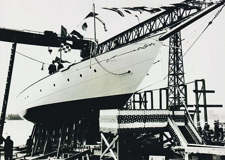a large boat with a crane aboard PURITAN Yacht for Sale