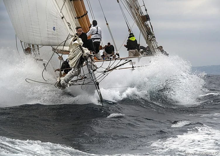 a group of people on a sailboat aboard PURITAN Yacht for Sale
