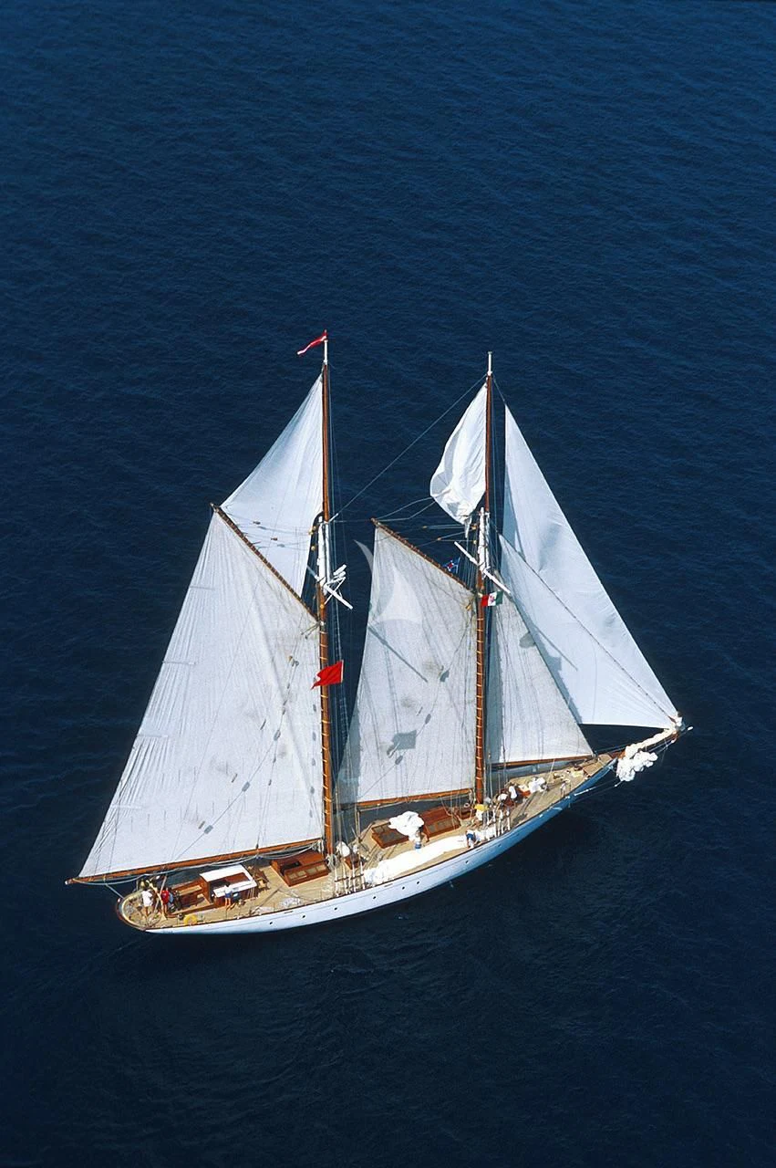 a sailboat in the water aboard PURITAN Yacht for Sale