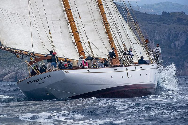 a group of people on a sailboat aboard PURITAN Yacht for Sale