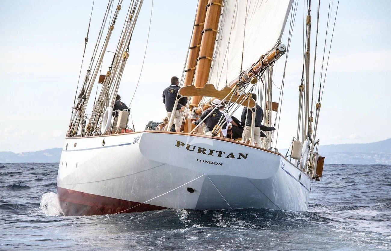 a sailboat in the water aboard PURITAN Yacht for Sale