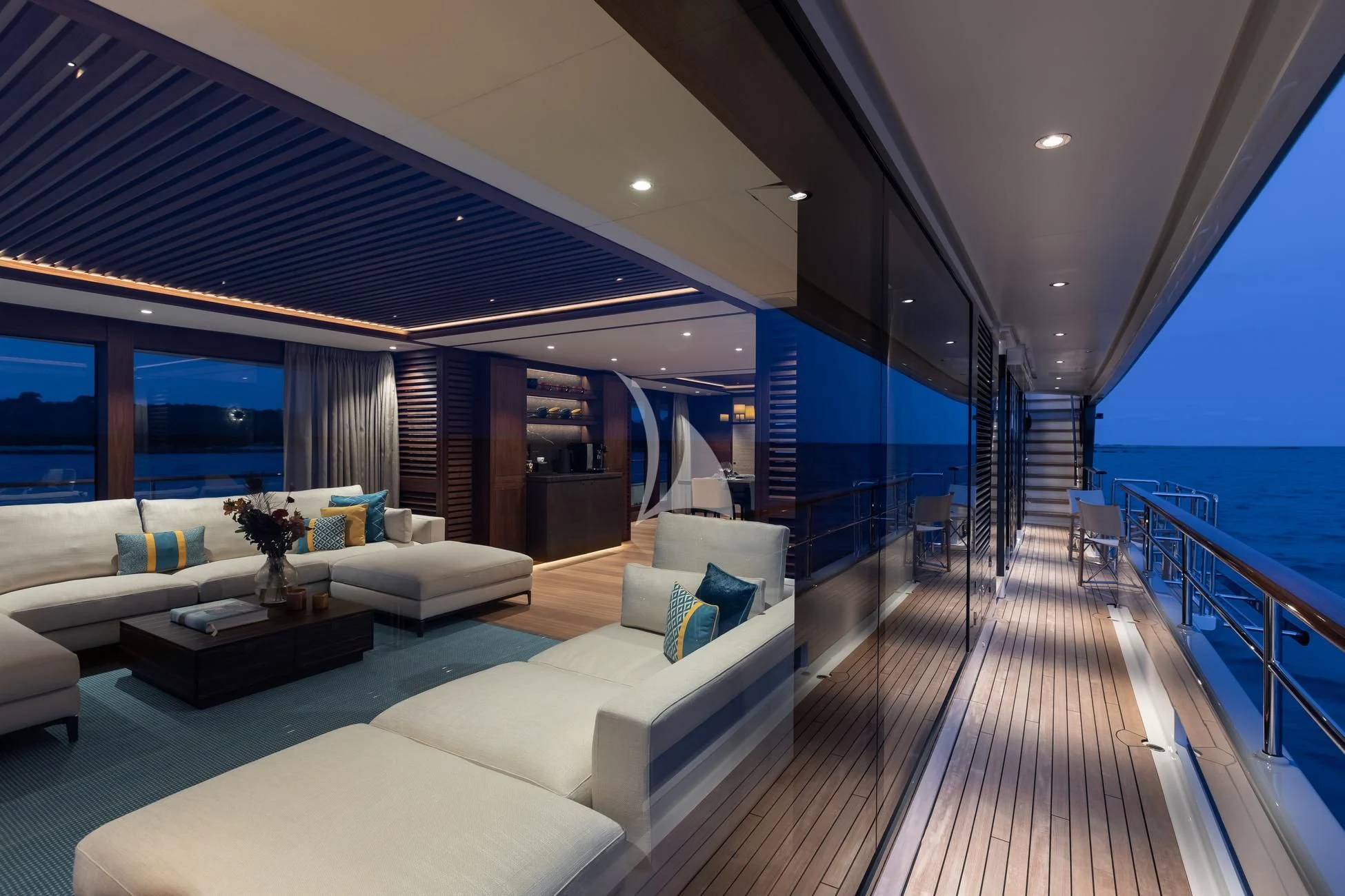 a living room with a wood floor aboard JOSEPHINE I Yacht for Sale