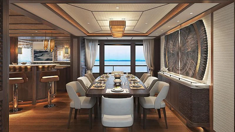 a room with a table chairs and a window aboard JOSEPHINE I Yacht for Sale