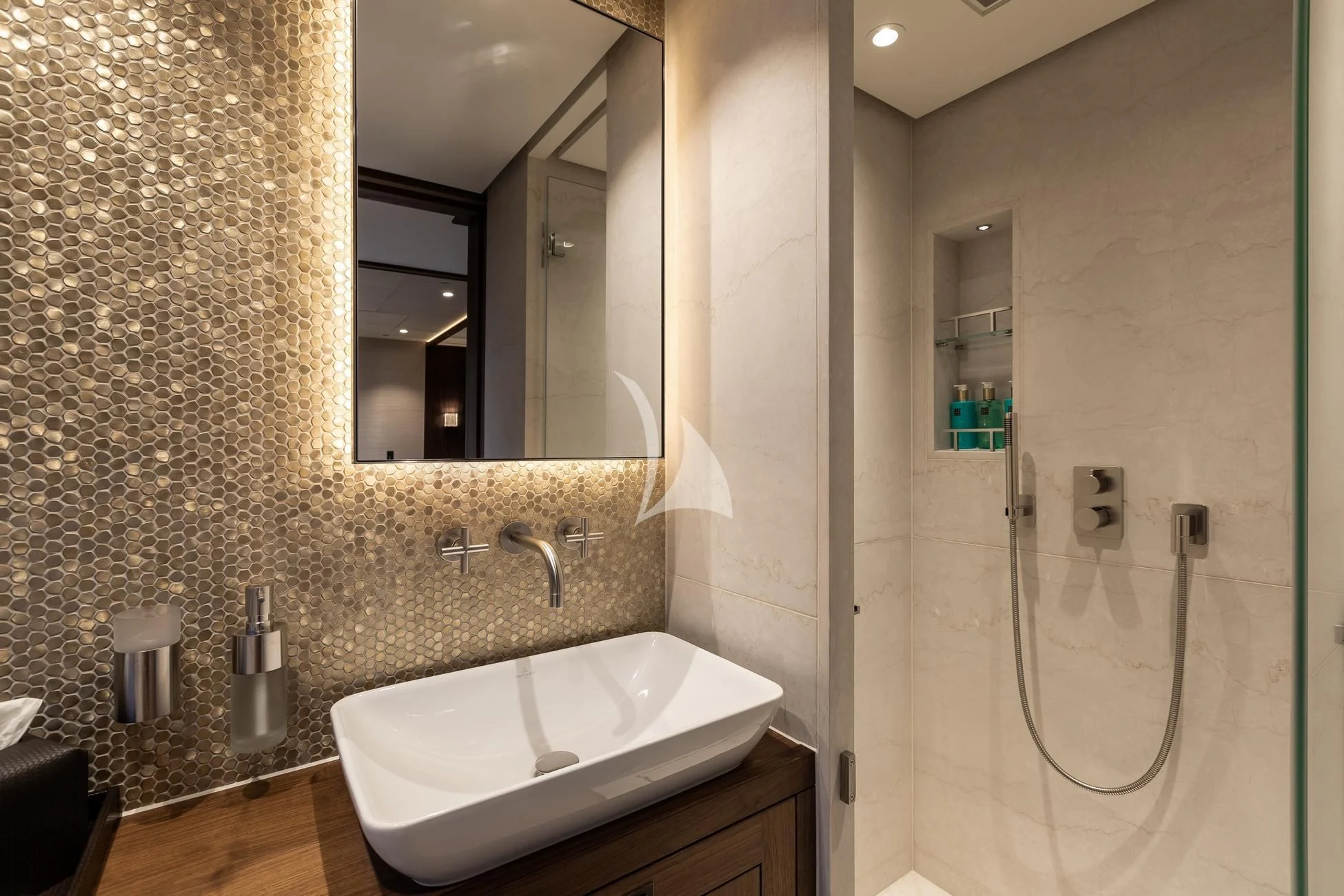 a bathroom with a sink and a mirror aboard JOSEPHINE I Yacht for Sale