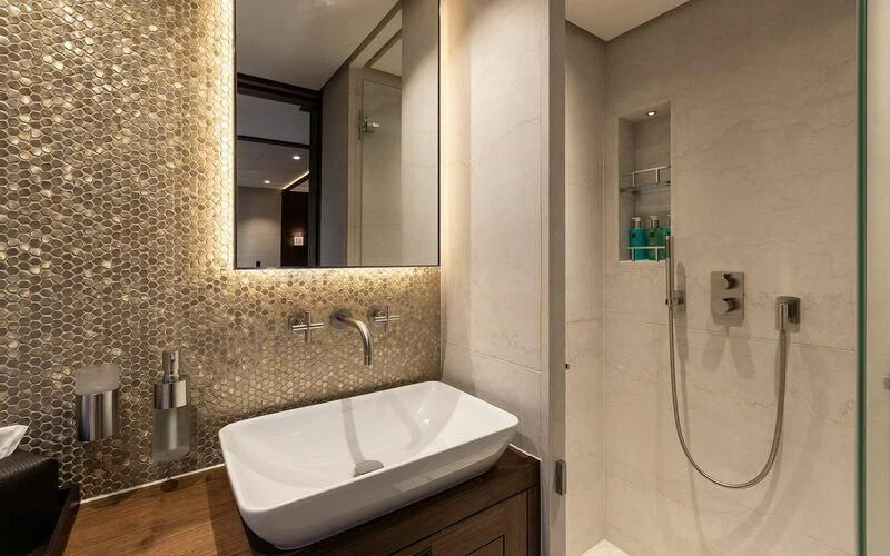 a bathroom with a sink and a mirror aboard JOSEPHINE I Yacht for Sale