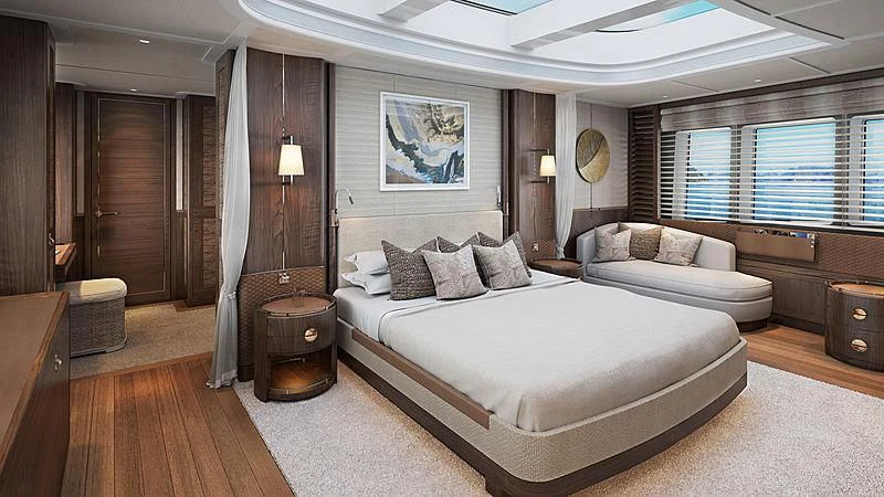 a large bedroom with a bed and a couch aboard JOSEPHINE I Yacht for Sale