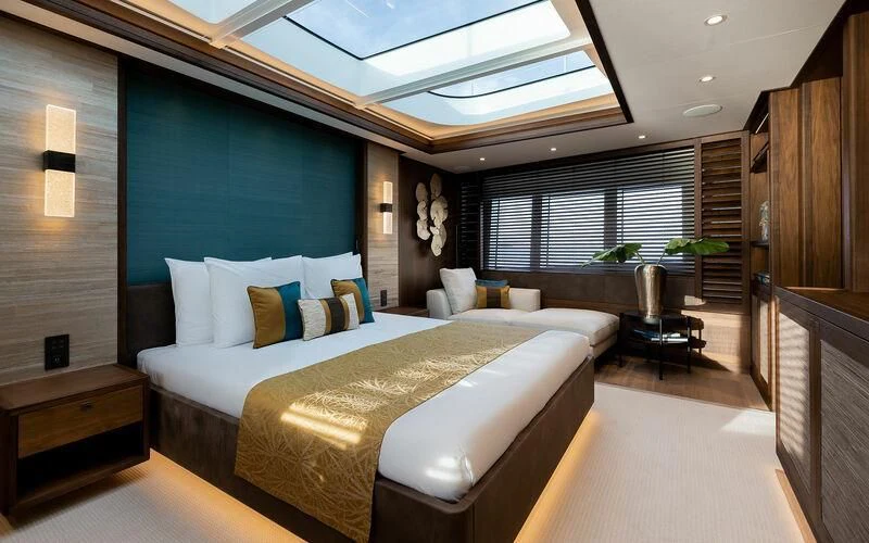a room with a bed and a window aboard JOSEPHINE I Yacht for Sale
