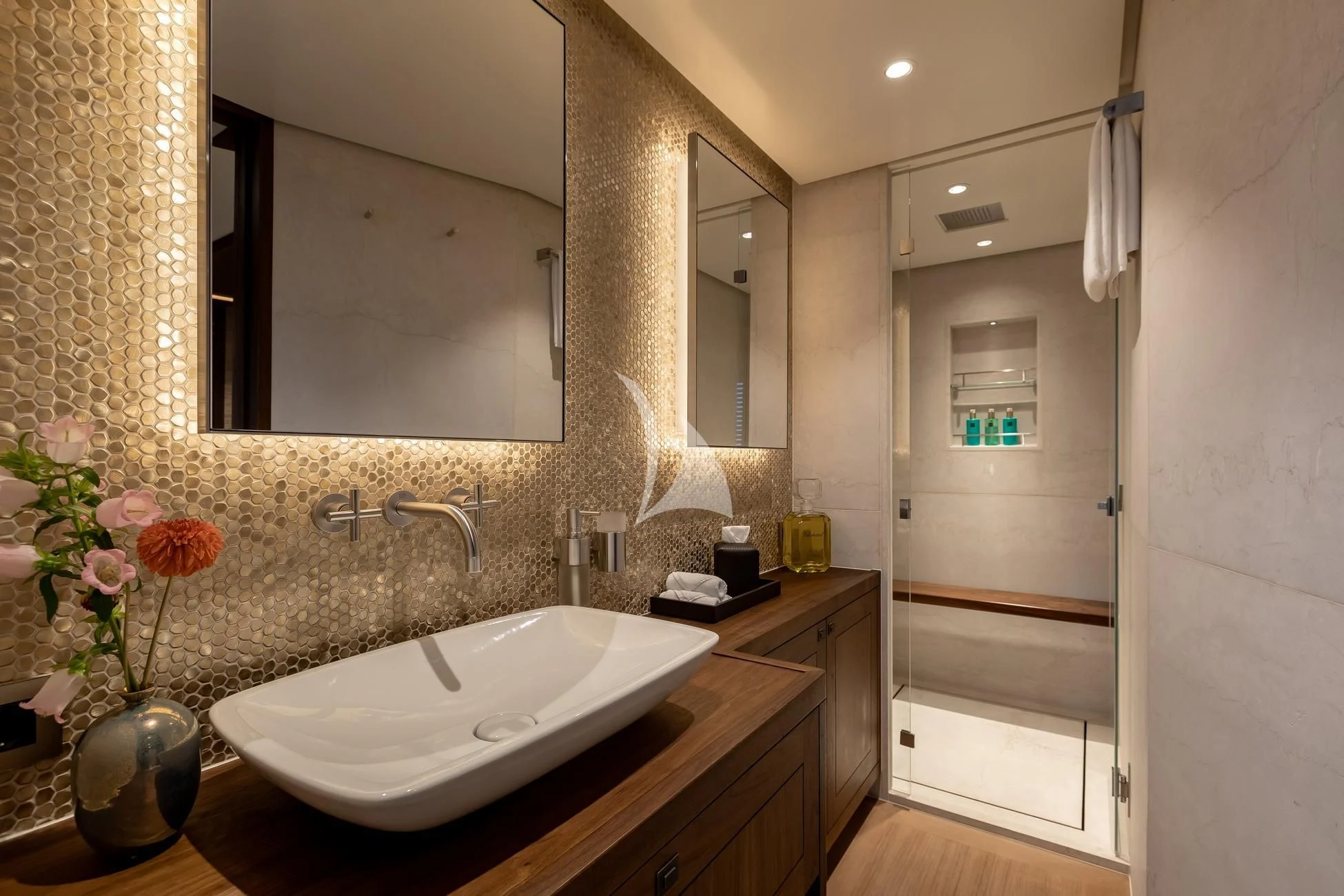 a bathroom with a large mirror aboard JOSEPHINE I Yacht for Sale