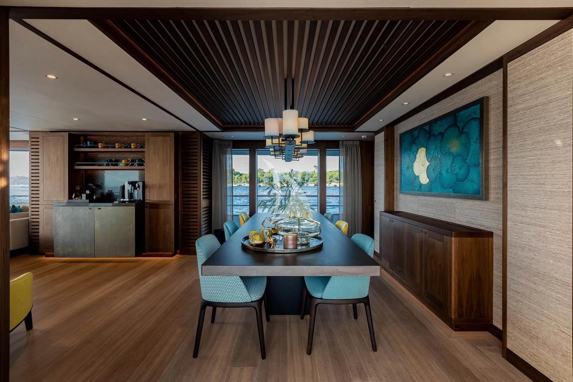 a dining room with a table and chairs aboard JOSEPHINE I Yacht for Sale