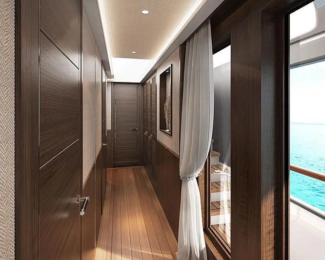 a hallway with a wood floor and a door with a window aboard JOSEPHINE I Yacht for Sale
