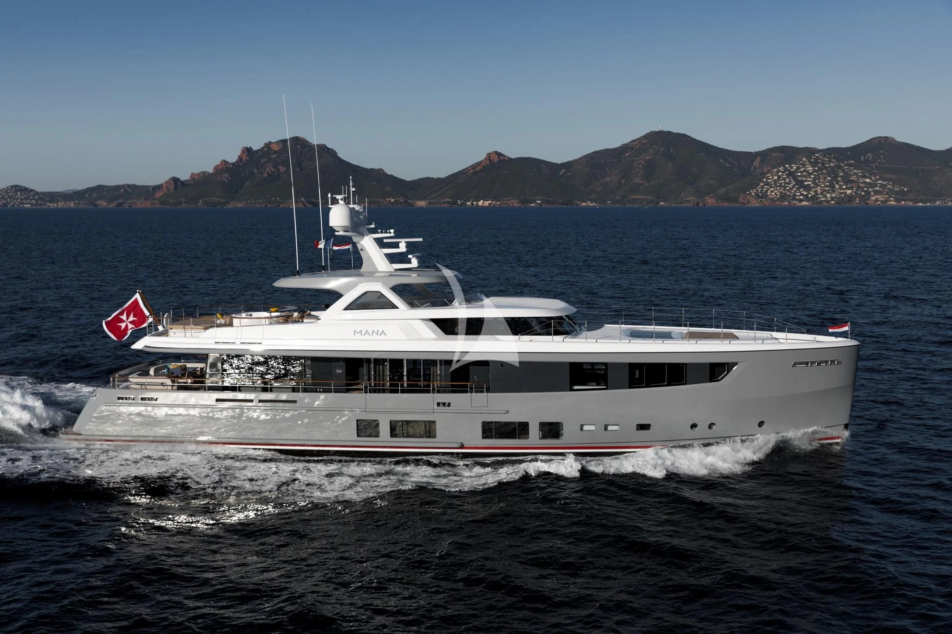 a large white boat on the water aboard JOSEPHINE I Yacht for Sale
