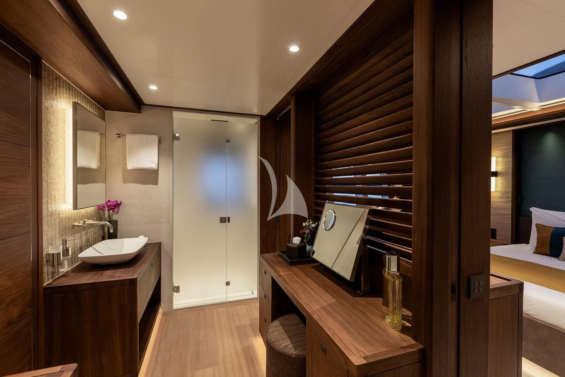 a bathroom with a wood floor aboard JOSEPHINE I Yacht for Sale