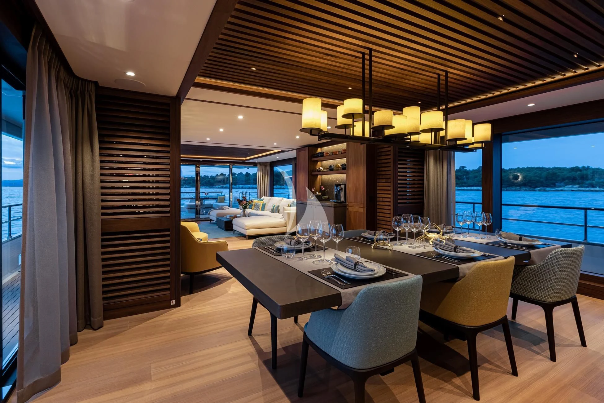 a dining room with a large window aboard JOSEPHINE I Yacht for Sale