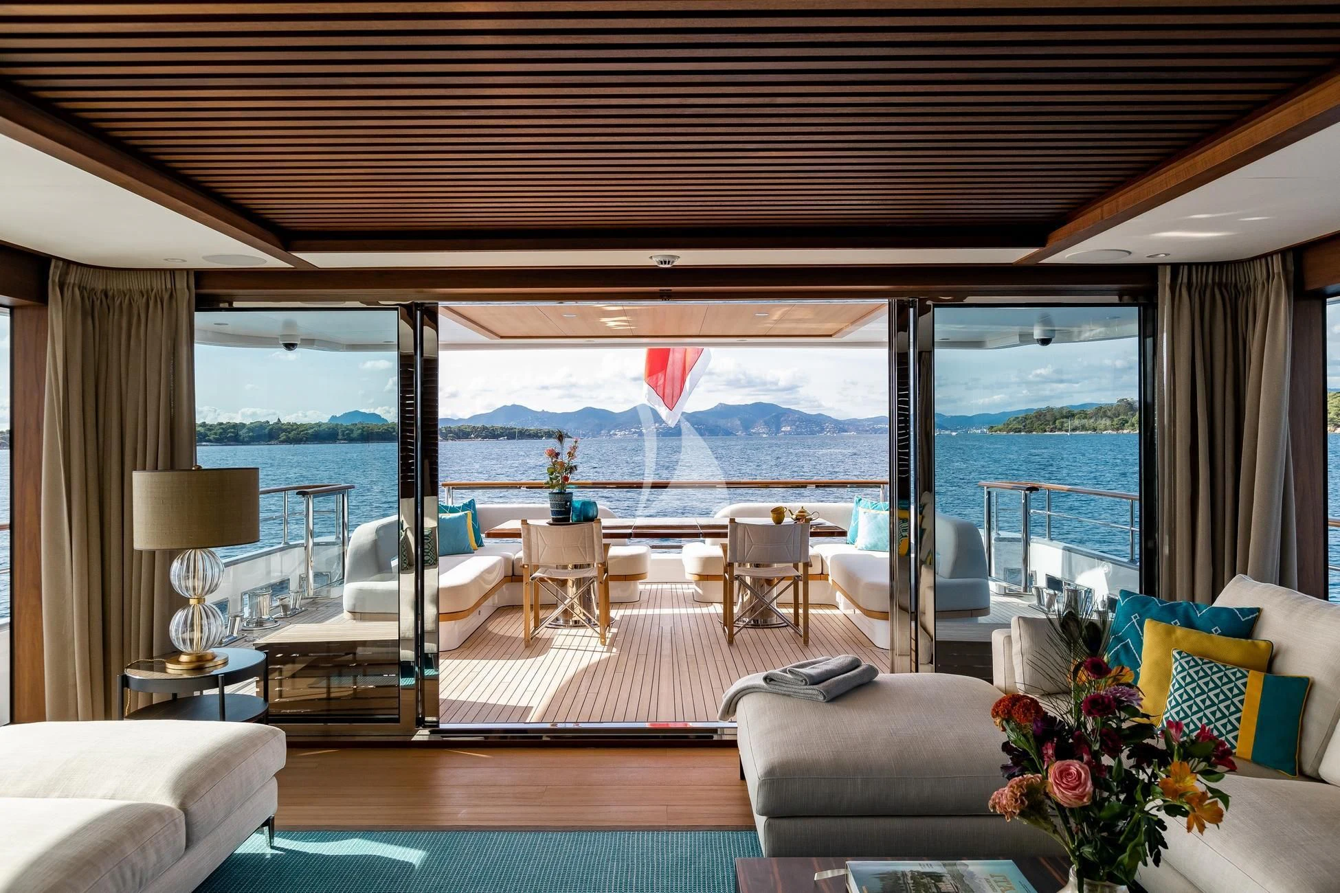 a room with a view of the ocean and the ocean aboard JOSEPHINE I Yacht for Sale
