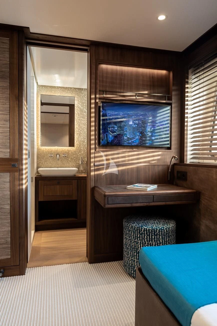 a bathroom with a mirror and a sink aboard JOSEPHINE I Yacht for Sale