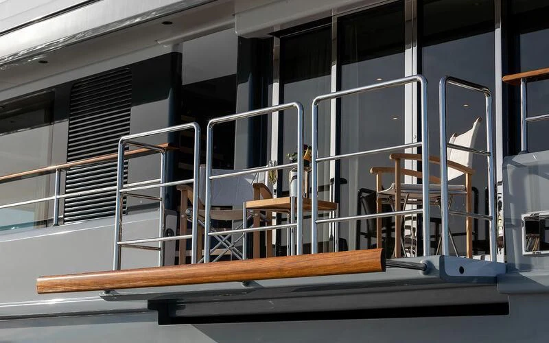a room with chairs and a staircase aboard JOSEPHINE I Yacht for Sale