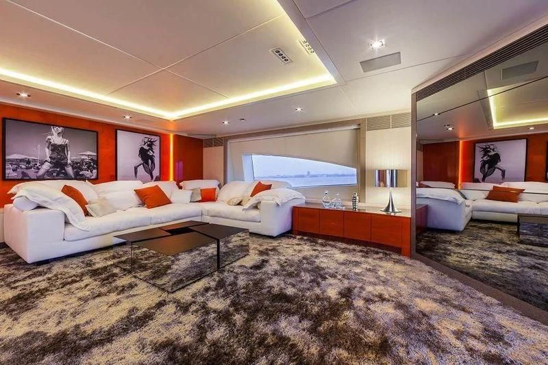 a room with a bed and a table aboard PANTHERA Yacht for Sale