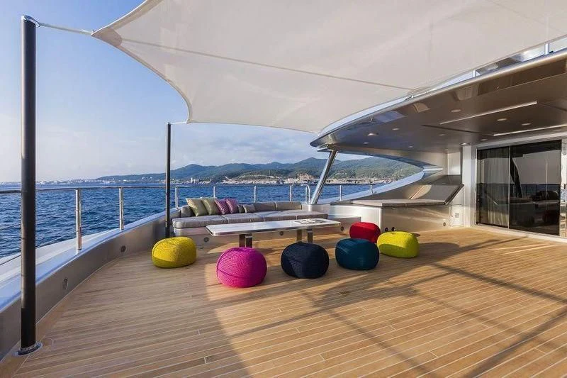 a deck with balls and a body of water in the background aboard PANTHERA Yacht for Sale