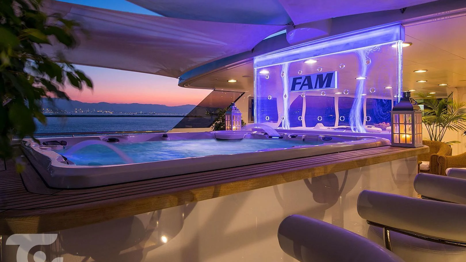 a pool at night aboard GRACE Yacht for Sale