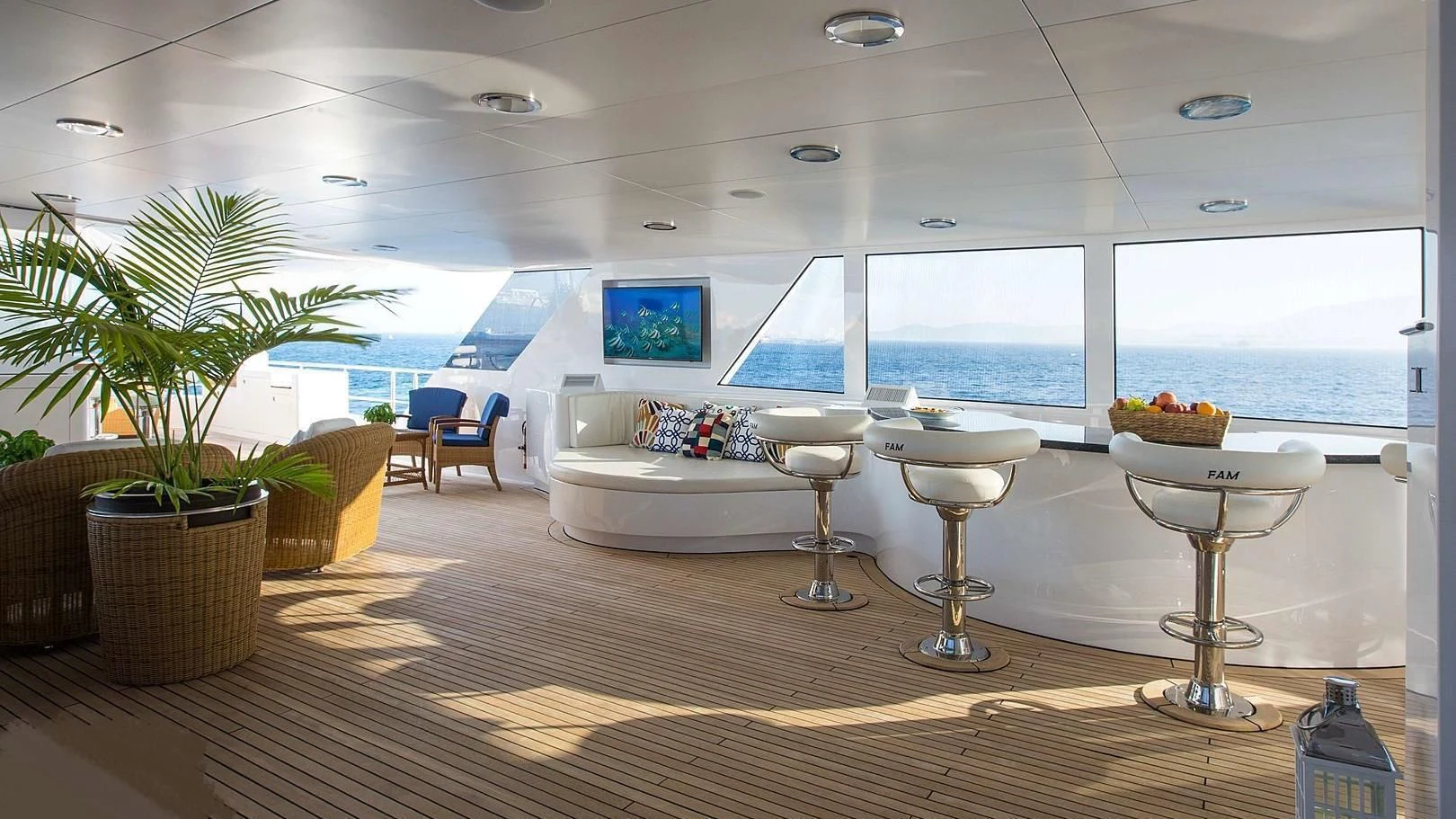 a room with a table and chairs aboard GRACE Yacht for Sale