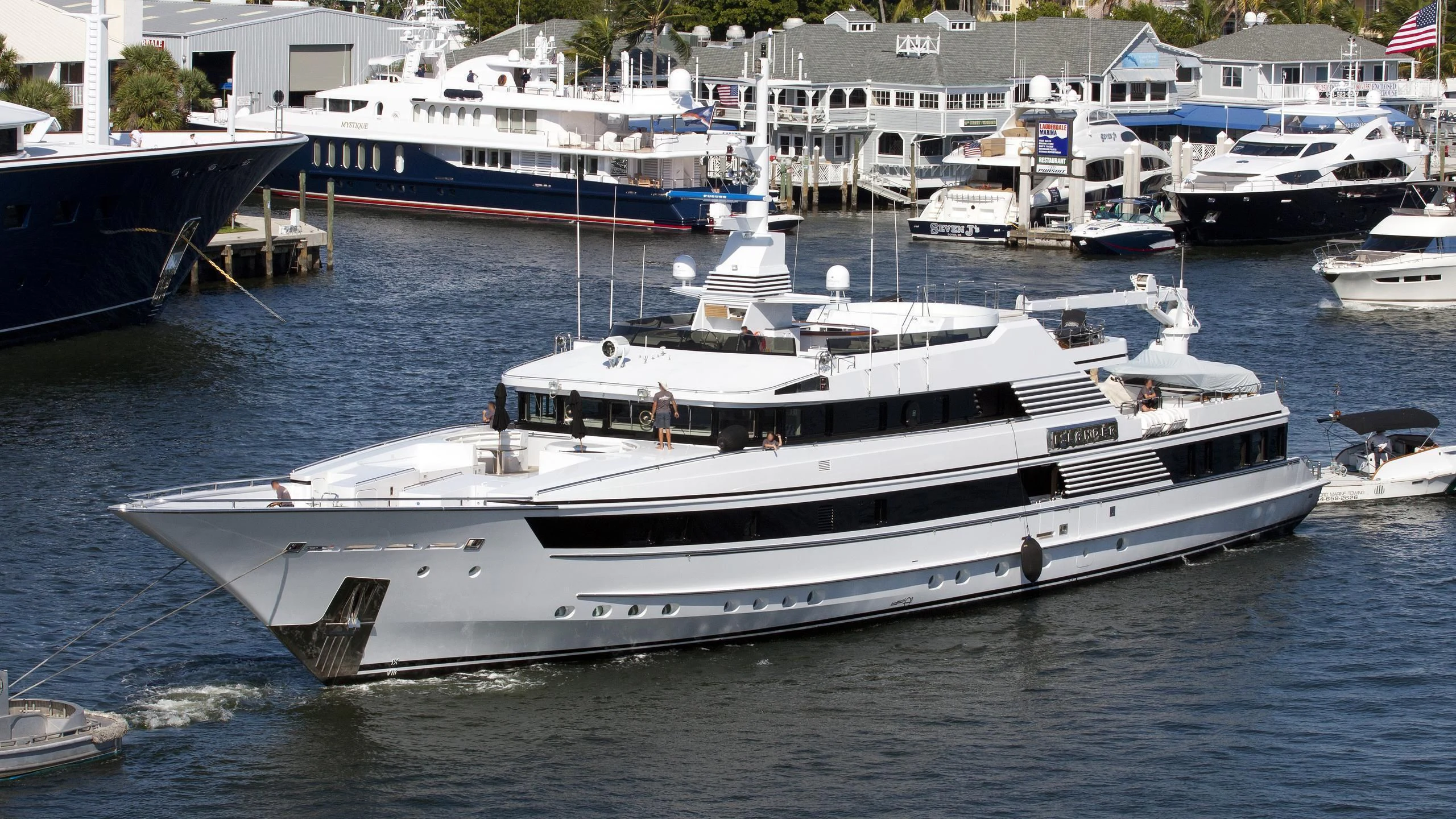 a group of boats in a harbor aboard GRACE Yacht for Sale