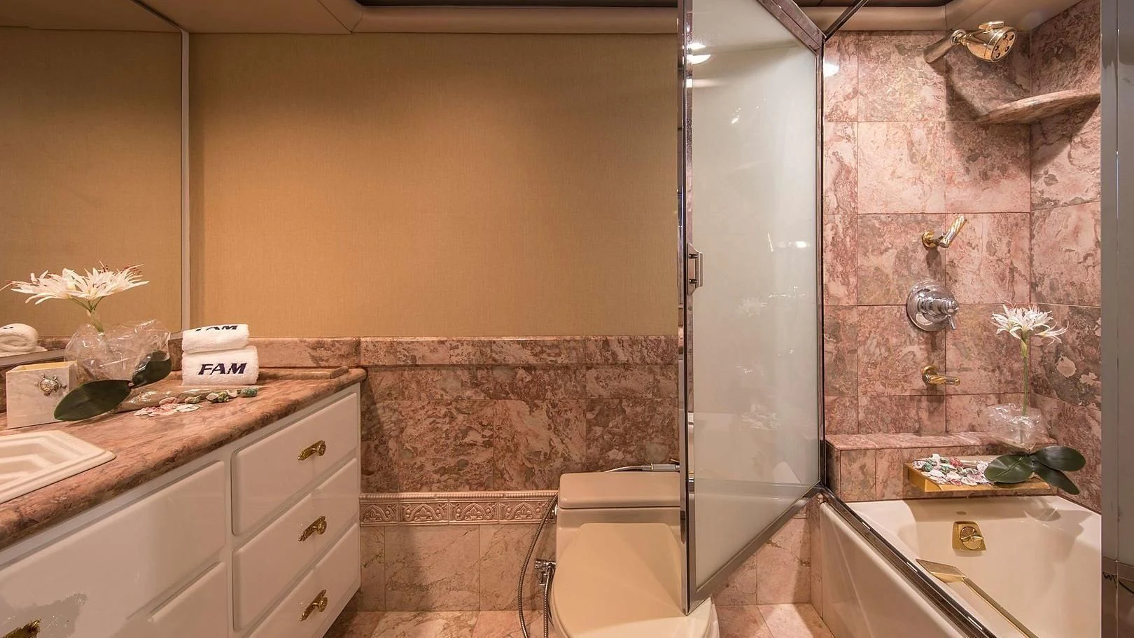 a bathroom with a marble shower aboard GRACE Yacht for Sale
