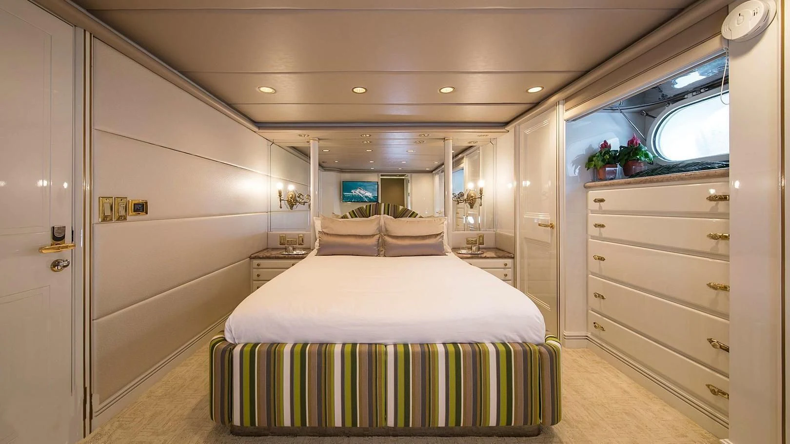 a bedroom with a bed aboard GRACE Yacht for Sale