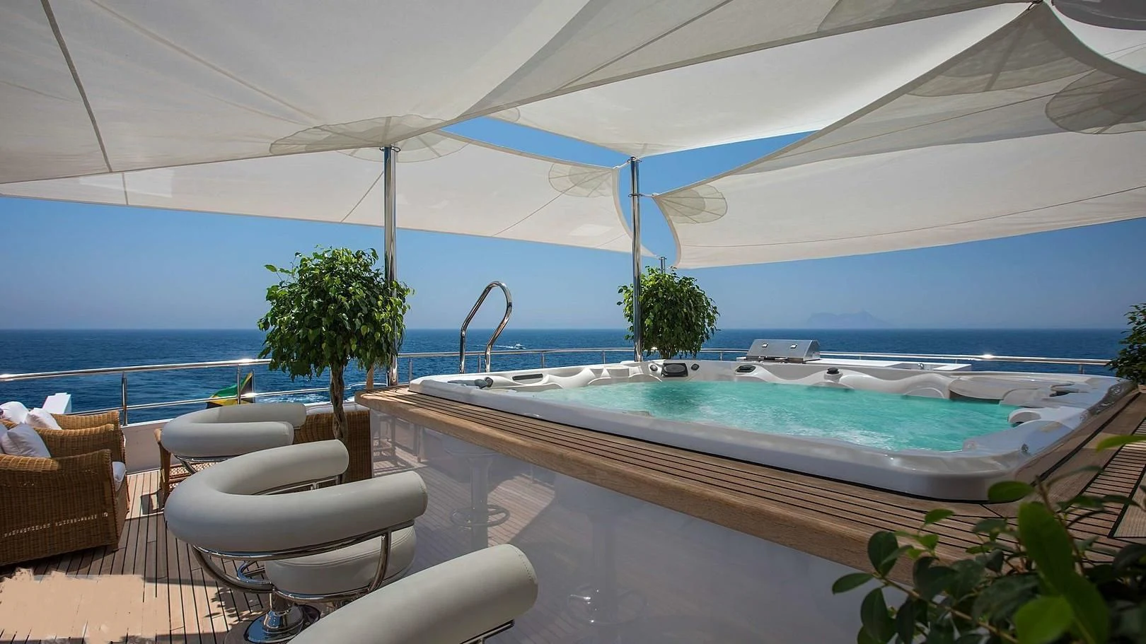 a large white tent with a pool aboard GRACE Yacht for Sale