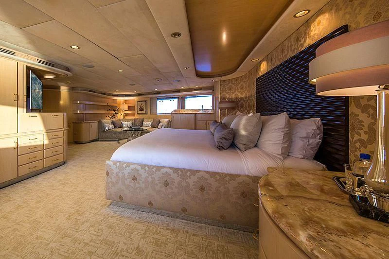 a large bed in a room aboard GRACE Yacht for Sale