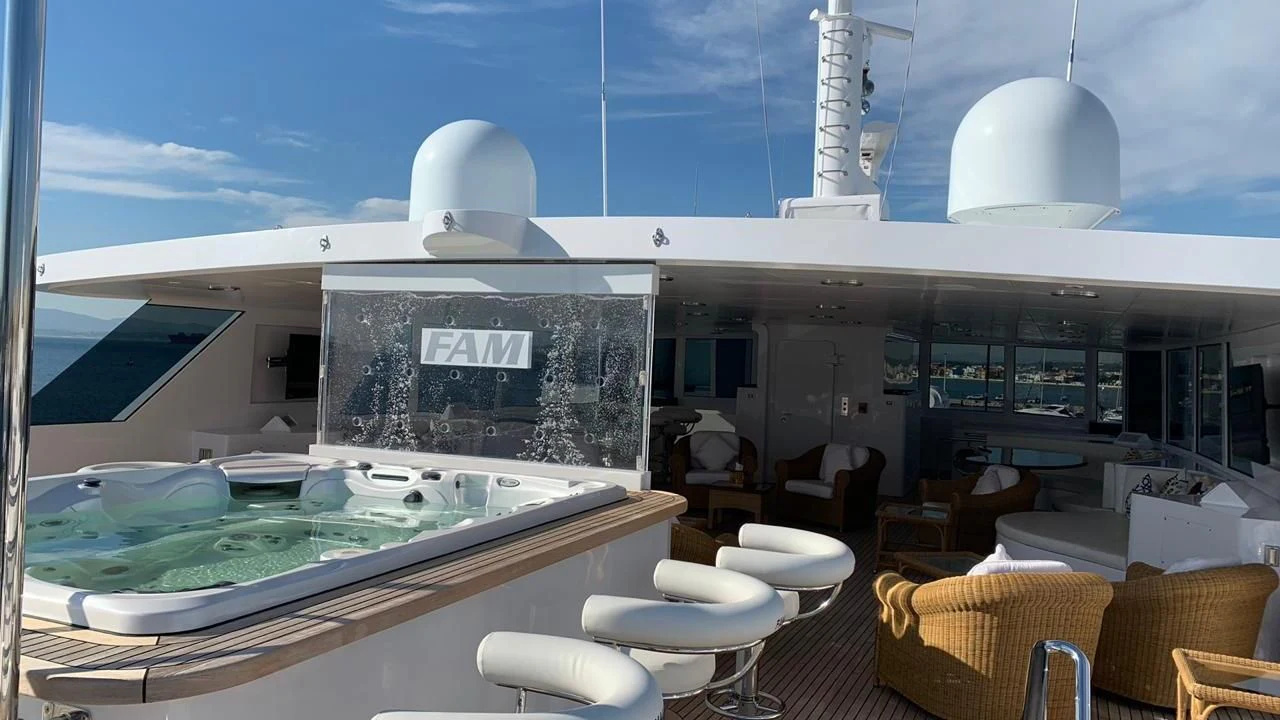 a swimming pool in a room aboard GRACE Yacht for Sale