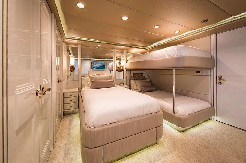 a room with a bed and a couch aboard GRACE Yacht for Sale