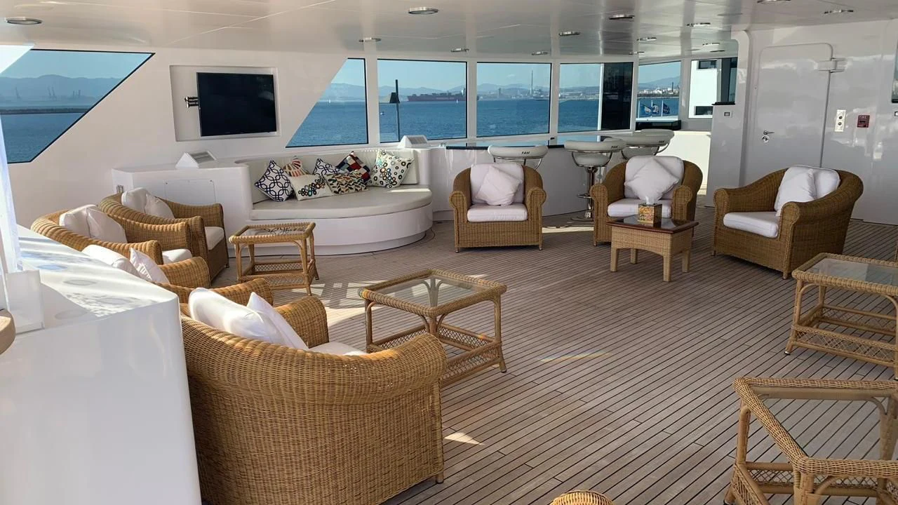 a living room with a large window aboard GRACE Yacht for Sale