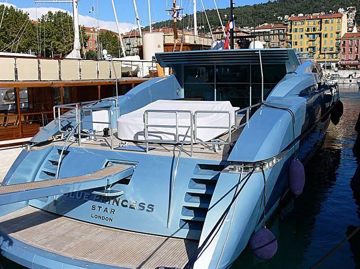 a boat docked in a harbor aboard BLUE PRINCESS STAR Yacht for Sale