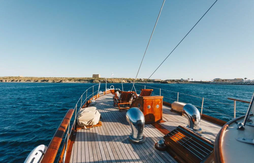 a boat with many seats on the deck aboard SILVER CAVALIER Yacht for Sale
